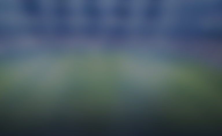 hupu-football-1780949246618-kaiyun-1png - 开云体育中心 Abstract, blurred landscape with a blue sky fading into green fields; no distinct details.