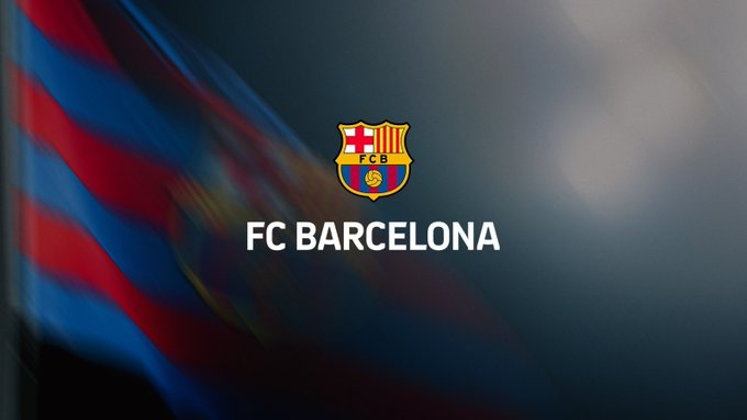 FC Barcelona crest centered on a dark blurred background with the text 'FC BARCELONA'.
